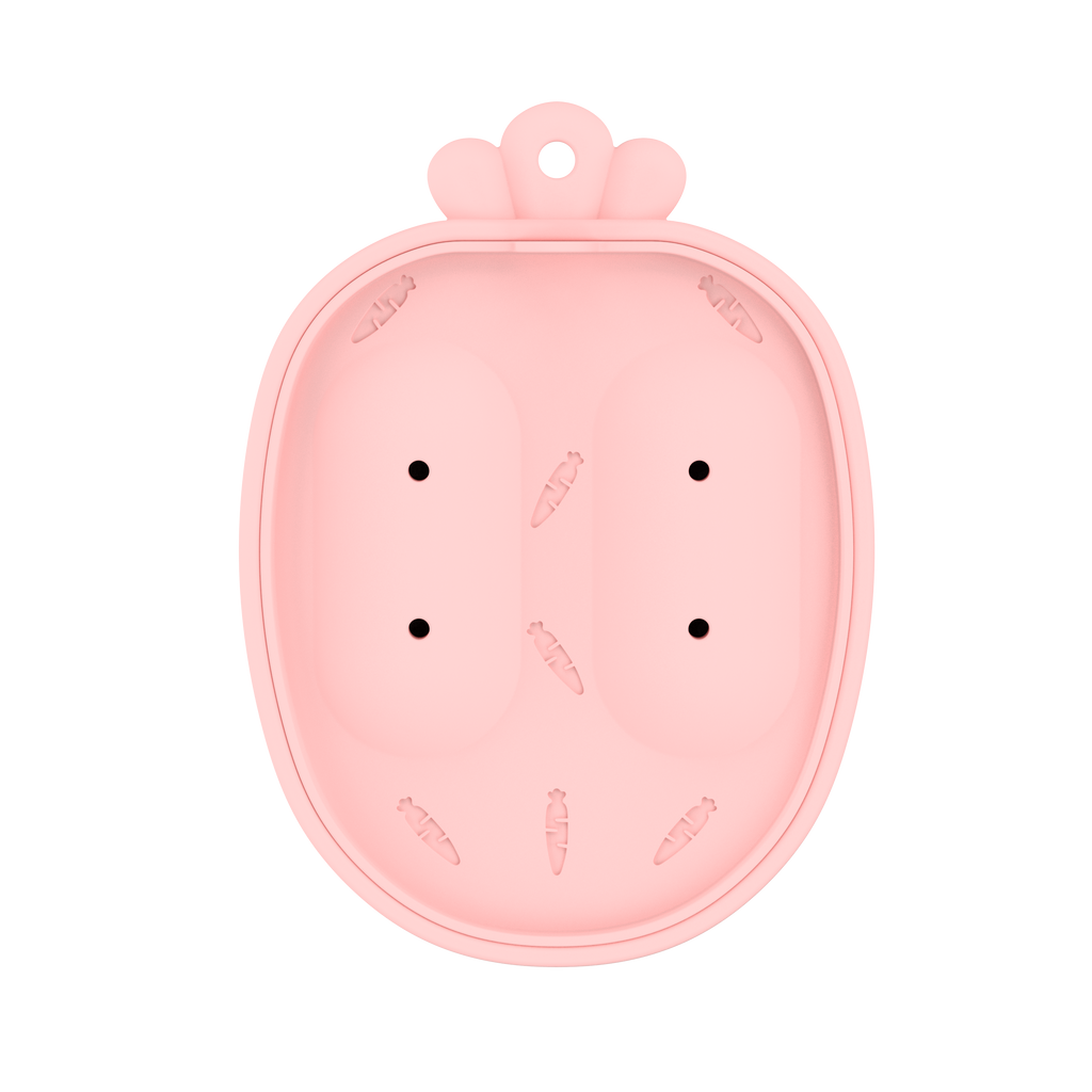 Pink popsicle mold lid top view with carrot embossed pattern from MAMAMEEPA